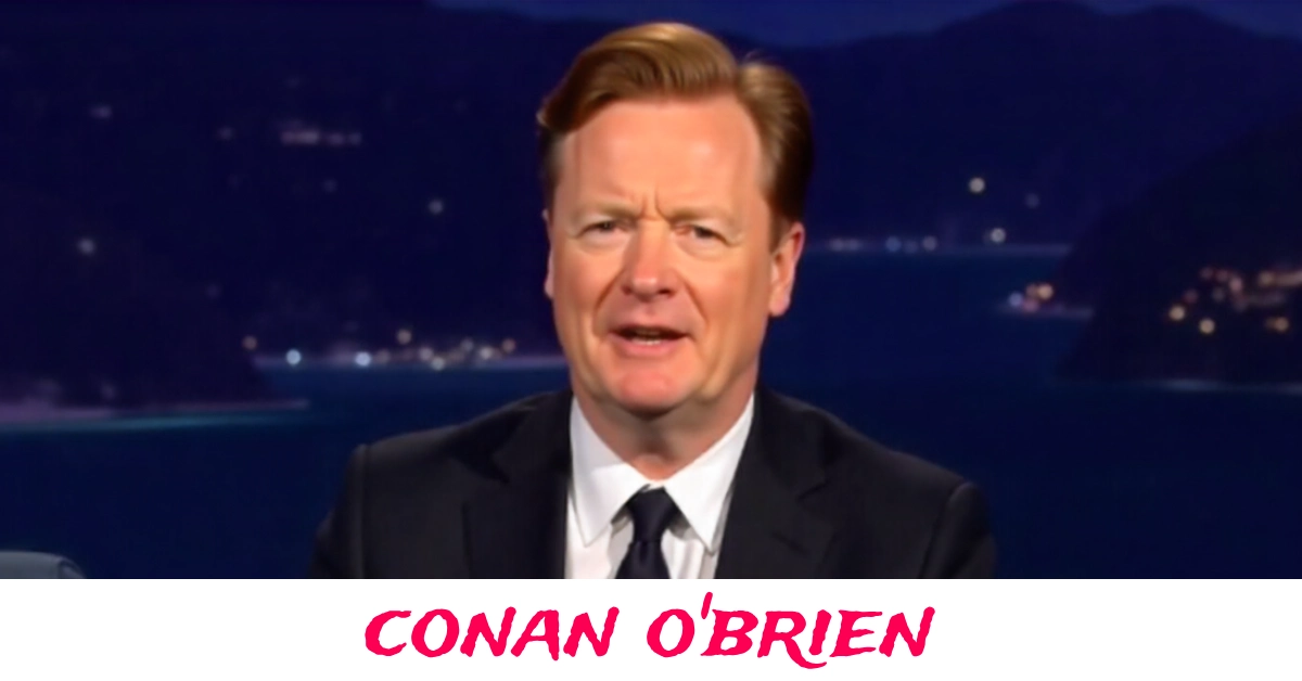 Conan O'Brien performing on stage with his signature comedic style